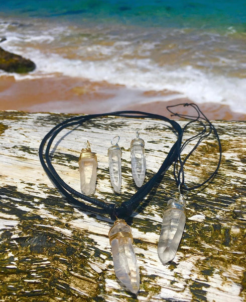 LEMURIAN SEED LASER PENDANTS